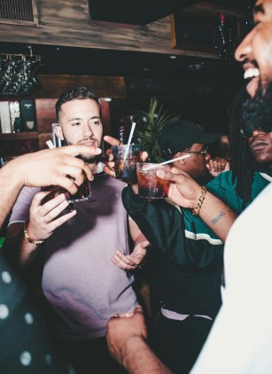 People enjoying drinks at a party